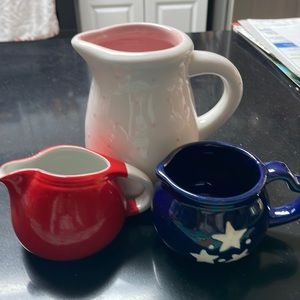 Really Sweet.  A pitcher and 2 small creamers.
